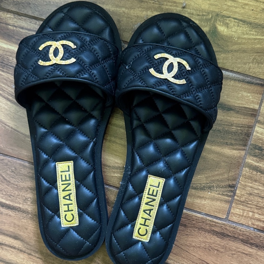 CHANEL Black Quilted Slide Sandals with Gold CC Emblems